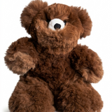 A brown alpaca plush teddy bear with a shaggy, curly fur texture, sitting against a solid white background.