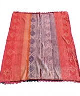 Archival Textile No. 109: An expansive large vintage Peruvian Frazada rug featuring a rhythmic all-over diamond pattern in a refined terracotta, violet, and coral gradient. The one-of-a-kind hand-loomed wool textile is shown on a white background, highlighting its traditional central union seam and complex iconographic density, suitable for Wabi-Sabi or modern architectural decor