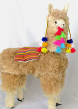 Large light brown alpaca llama plush with colorful pompoms handmade in Peru, boho nursery decor accessory