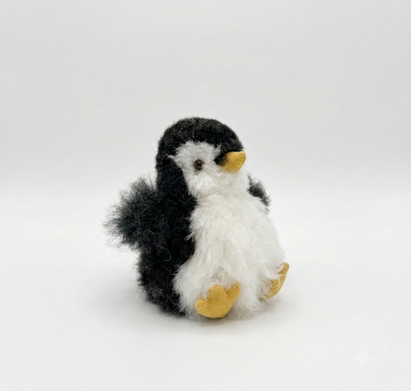 Mini alpaca penguin stuffed animal, 6 inches tall, natural white and hand-dyed black tuxedo pattern, handmade in Peru