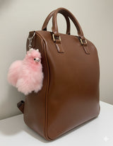 Pink lucky llama bag charm handmade in Peru, vibrant alpaca fur keychain soft backpack accessory