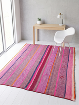 Archival Textile No. 104: An unusually saturated pink berry and violet vintage Peruvian Frazada rug. This hand-loomed wool textile features a traditional central union seam and is suitable as a Bohemian area rug or wall hanging.