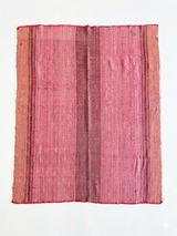 Archival Textile No. 107: An expansive large vintage Peruvian Frazada rug featuring a continuous all-over diamond eye weave. The one-of-a-kind hand-loomed wool rug is defined by a soft rose and berry gradient, shown on a white background with a signature central union seam, suitable as a monumental textile wall art or statement area rug.