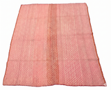 Archival Textile No. 110: A vintage Peruvian Frazada rug featuring a rare all-over micro-diamond weave. The one-of-a-kind hand-loomed wool rug is presented on a white background, showcasing its sophisticated dusty rose and peach gradient and traditional central union seam.