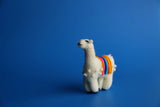 One Single Andes LLama Ornament standing in a blue background