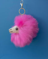 Vibrant hot pink alpaca fur keychain bag charm, handmade ethical Peruvian artisan plush accessory