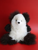 Handmade 12 inches panda bear doll made from real black and white huacaya alpaca fur on a white background.
