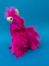 small 7-inch fuchsia pink suri alpaca with long silky fur handmade in Peru