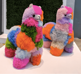 Rainbow-colored handmade alpaca fur llama stuffed animal from Peru
